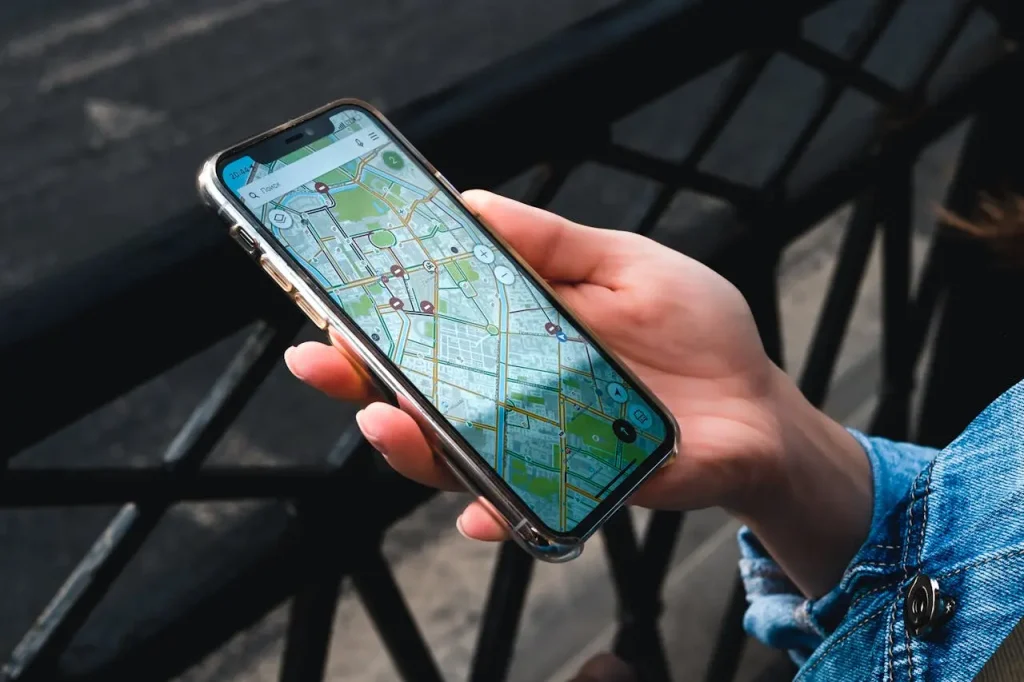 A phone with a map showing attractive neighborhoods for investors.